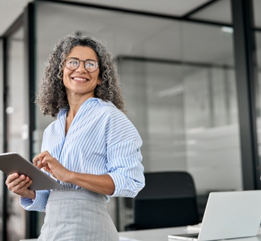 Woman smiling in an office